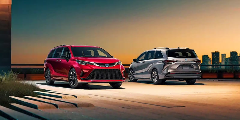 A red and a gray 2024 Toyota Sienna. 